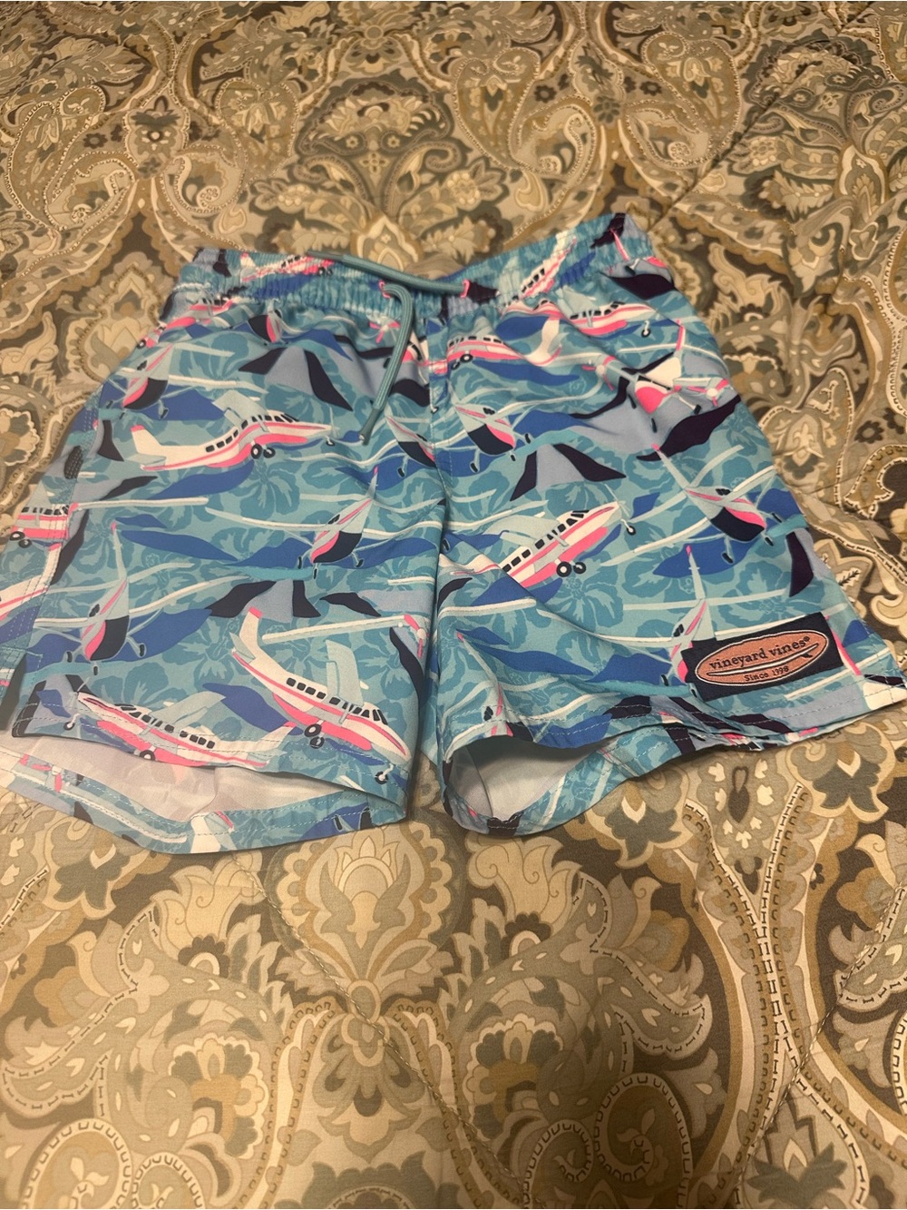 Vineyard Vines Blue Swim Trunks with Pink Airplane Print